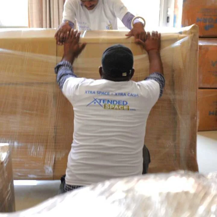 household items shifting in warehouse storage space
